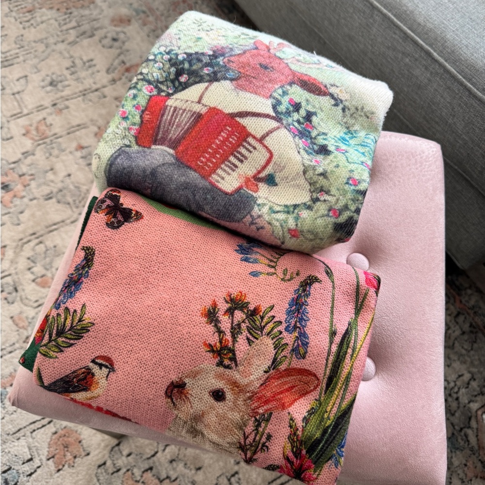 Pair of Whimsical Scene Sweaters
